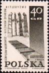 Памятник жертвам фашизма в Освенциме-Моновицах. Текст: «Мартирология и борьба»
