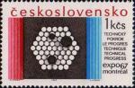 Три темных круга в шестиугольнике из светлых кружков - условное изображение реактора первой в Чехословакии атомной электростанции. Текст: «Технический прогресс»