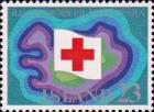 Флаг Красного Креста на фоне острова Исландия