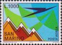 Гора Монте-Титано и символическое изображение полета