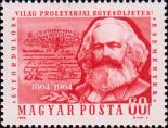 Портрет К. Маркса, слева - копия удостоверения члена I Интернационала. Текст: «Пролетарии всех стран, соединяйтесь!»