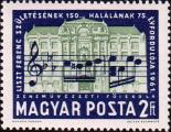 Нотная строка из произведения Ф. Листа на фоне здания будапештской консерватории 