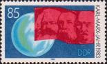 Земной шар, флаг с портретами К. Маркса, Ф. Энгельса и В. И. Ленина